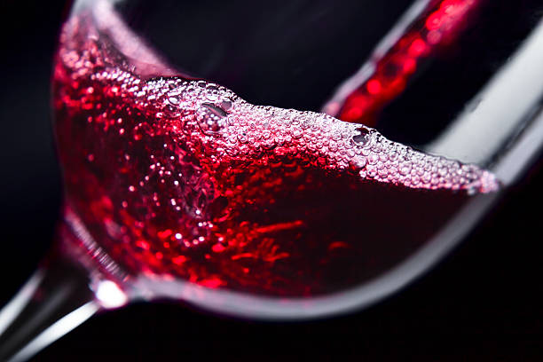 istock Red wine in wineglass 526549258