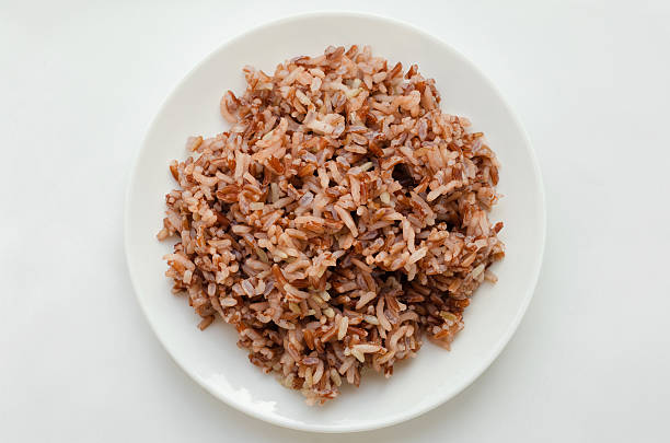 istock Brown Rice In The White Plate. 526550768