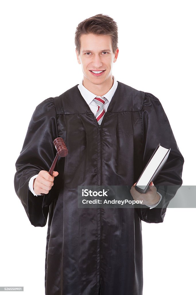 Judge Holding Gavel And Book Male Judge Holding Gavel And Book Over White Background Adult Stock Photo