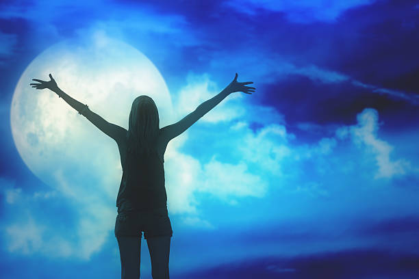 istock Girl enjoying the night sky. 526551102