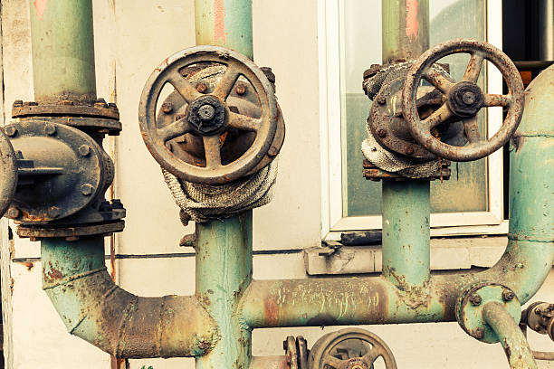 istock Industrial pipe valves Control system in the old steel mill 526552324