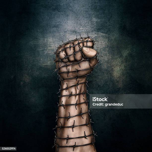 Barbed Wire Fist Stock Photo - Download Image Now - Prison, Freedom, Riot