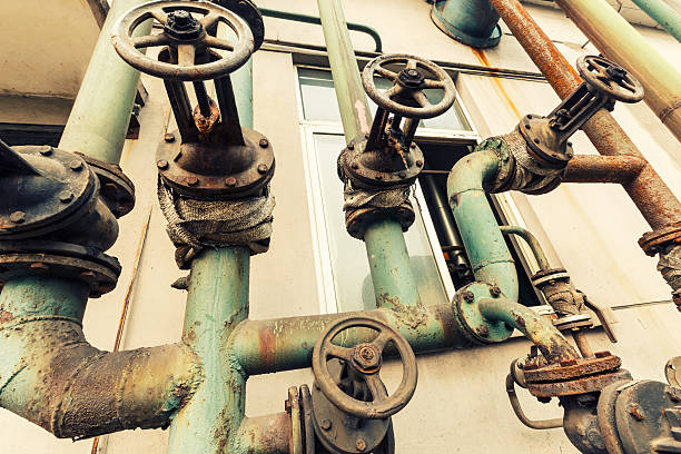 istock Industrial pipe valves Control system in the old steel mill 526554562