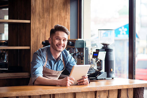 istock Pleasant barista standing  at the counter 526558812