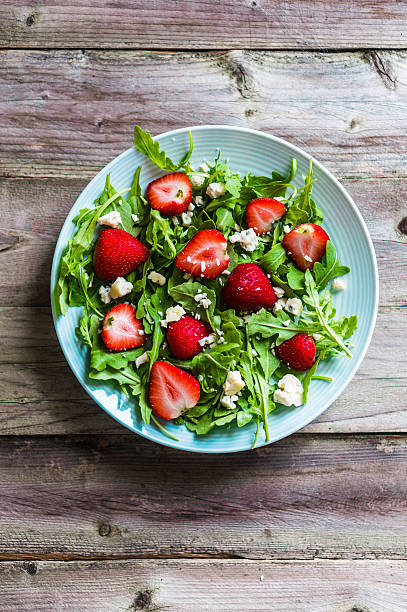 istock Salad with arugula,strawberries and cheese 526559624
