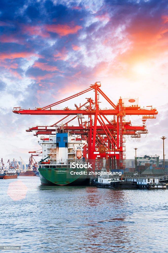 Industrial container freight Trade Port scene at sunset Industrial container freight Trade Port beautiful scene at sunset Commercial Dock Stock Photo