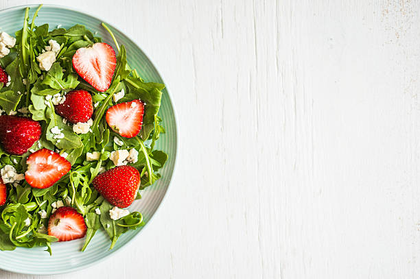 istock Salad with arugula,strawberries and cheese 526559802