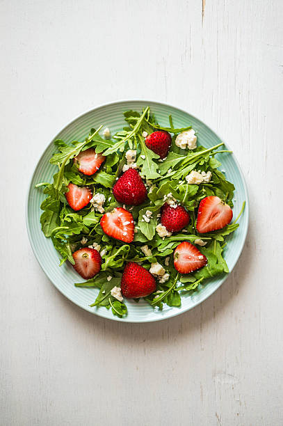 istock Salad with arugula,strawberries and cheese 526559856