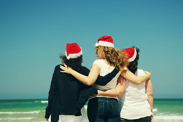 istock Women wearing christmas hat 526562802