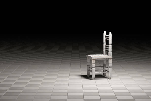 istock Wooden chair abandoned in empty room 526564776
