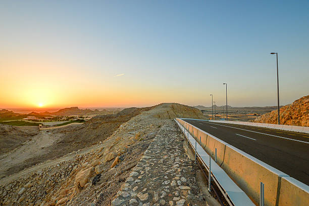istock Al Ain, Jebel Hafeet, Sunset and the road 526567632