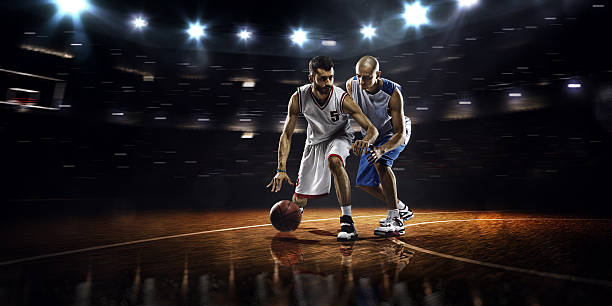 istock Two basketball players in action 526568923