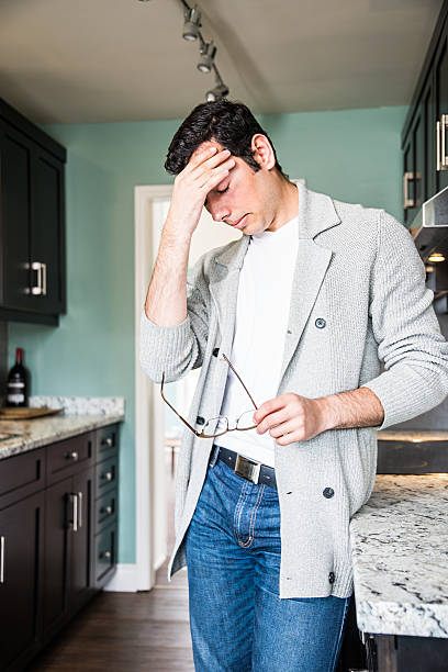 istock Stressed, tired, upset man at home 526569734