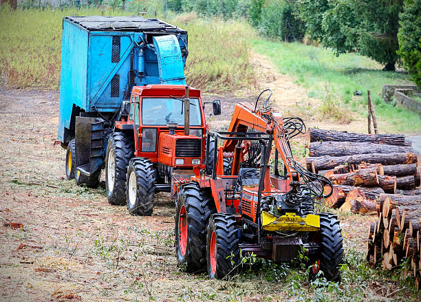 istock Old tractor and equipment used in timber industry. 526569911