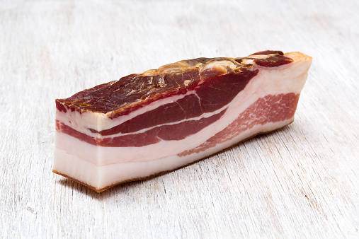 Bacon on wooden background