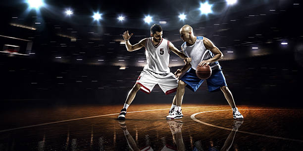 istock Two basketball players in action 526571161