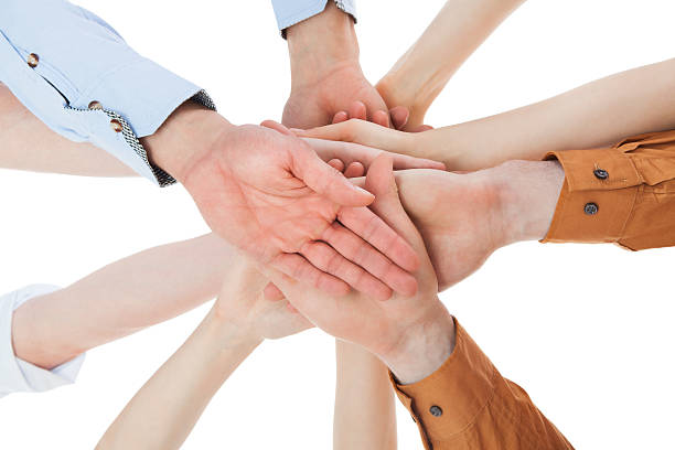 istock Friends With Their Hands Stacked Together 526571709
