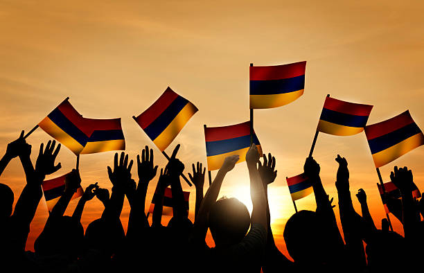 istock Crowd Holding The Armenian Flag 526573359