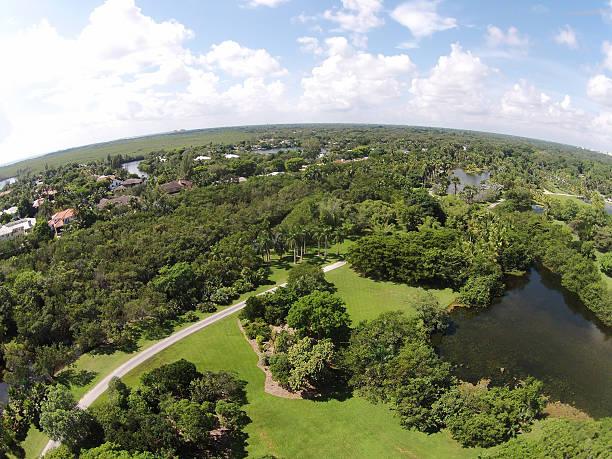 istock Tropical park and lake aerial view 526594363