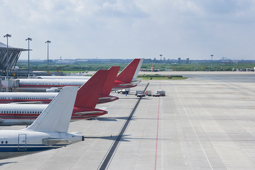 Planes on a Runway at Shanghai's Pudong Airport