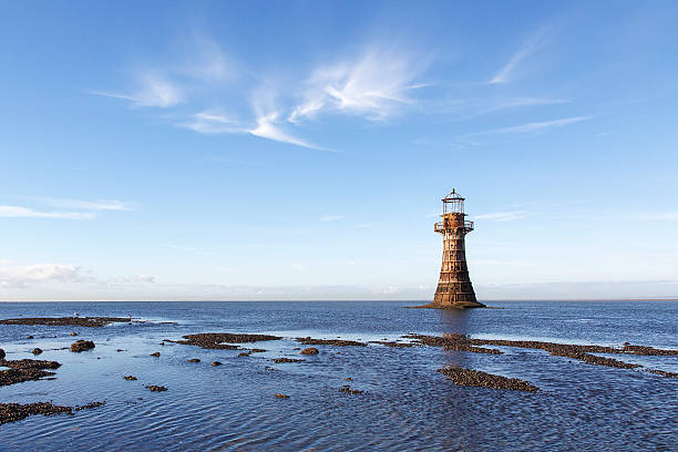 phare - water rippled wave river photos et images de collection