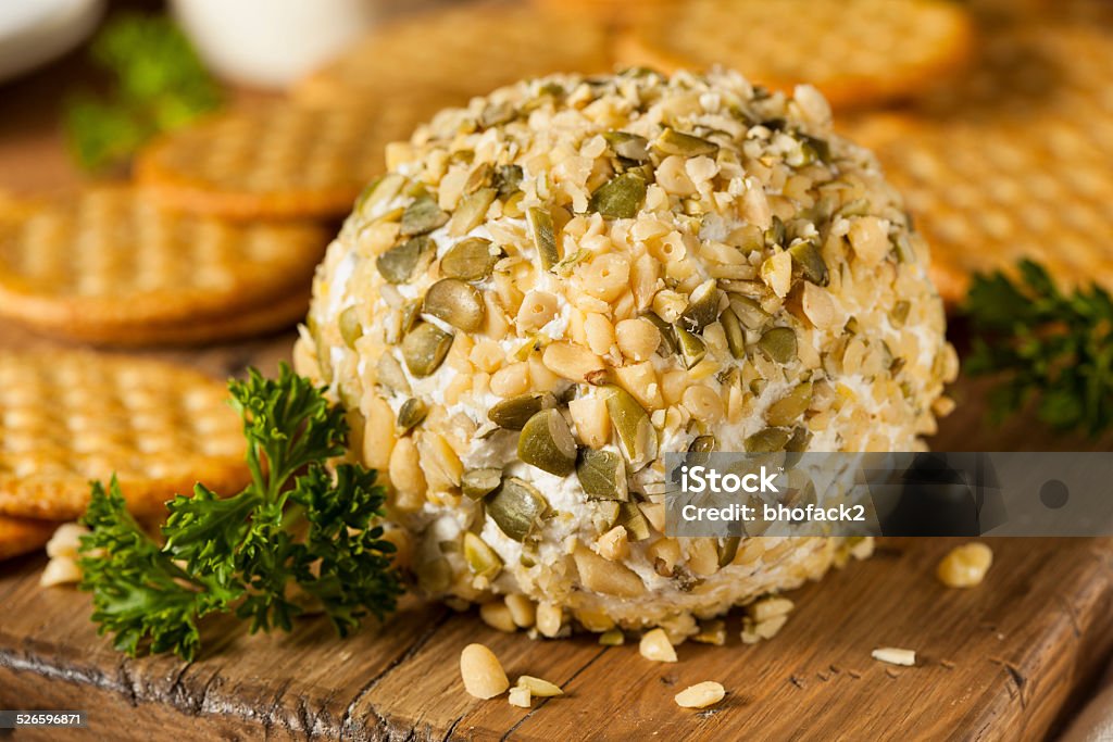 Homemade Cheeseball with Nuts Homemade Cheeseball with Nuts and Wheat Crackers Almond Stock Photo