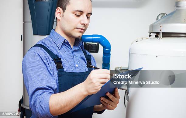 Plumber At Work Stock Photo - Download Image Now - Adult, Assistance, Blue-collar Worker