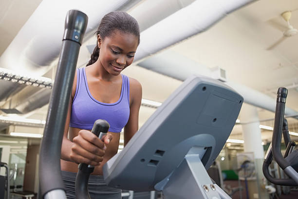 istock Fit woman working out on the cross trainer 526598401