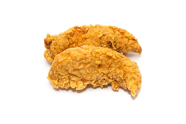istock Golden brown fried chicken drumsticks on white background 526598697