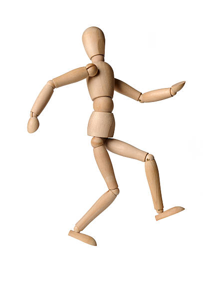 istock Wooden man mannequin on isolated white background 526599775