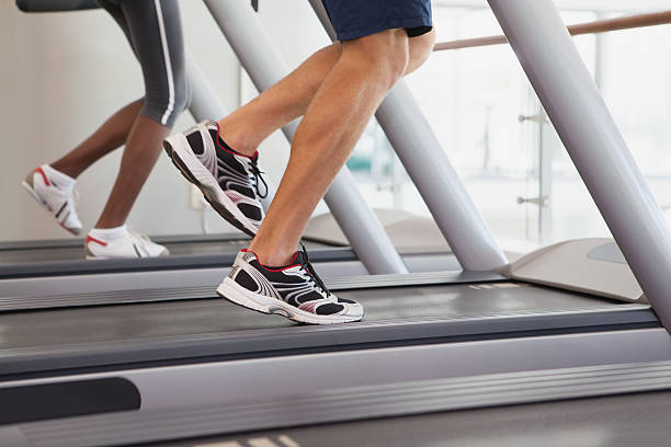 istock Fit people running on treadmills 526600407