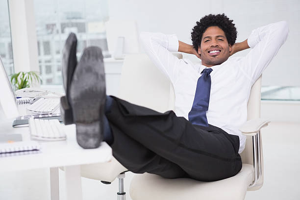 istock Handsome photo editor working at desk 526600913