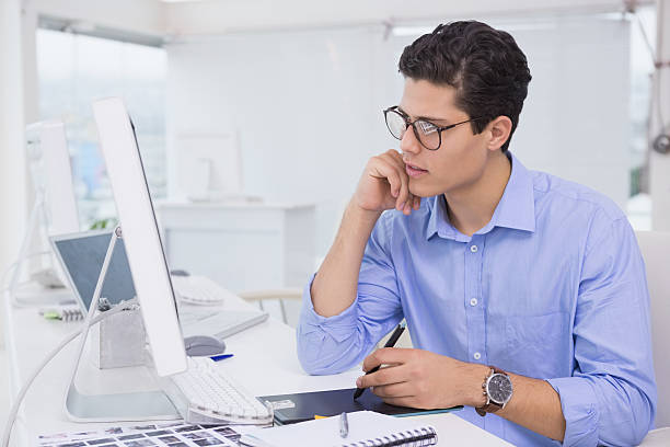 istock Casual graphic designer working at desk 526601157