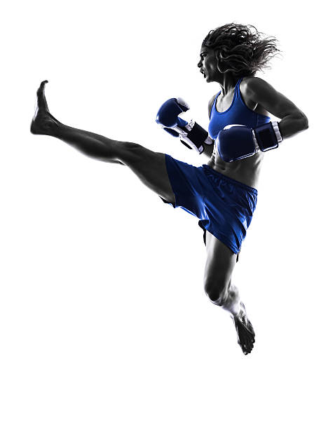 istock woman boxer boxing kickboxing silhouette isolated 526635701