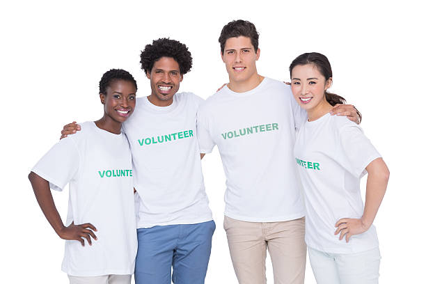 istock Young smiling volunteers looking at camera 526637895