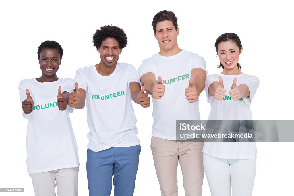 Young smiling volunteers looking at camera Young smiling volunteers looking at camera on white background 20-24 Years Stock Photo