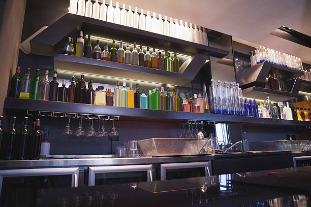 istock Close up on bar with bottle in a line 526638137
