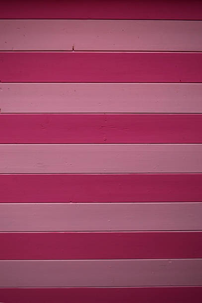 wooden wall painted pink and red