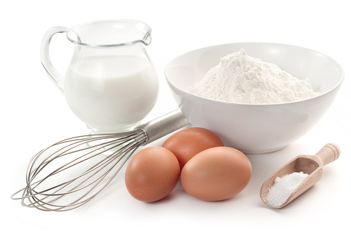 eggs, flour, milk, sugar and wire whisk