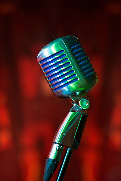 istock Metall Vintage Microphone against red background 526639169