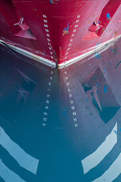 istock Depth numbers reflected from the bow of a red boat 526641357