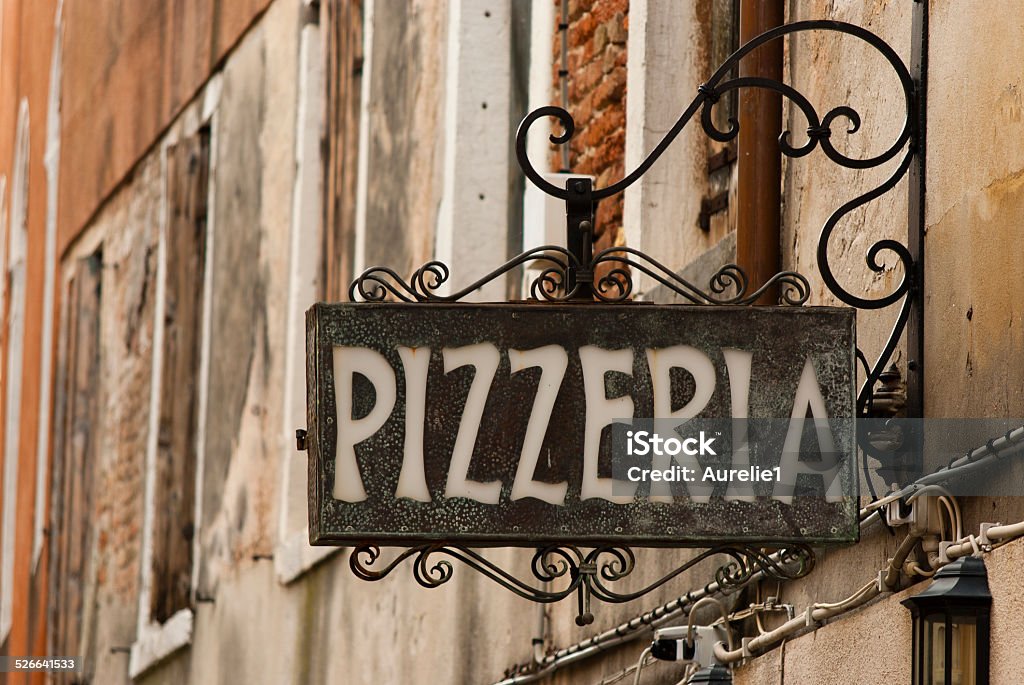 Pizzeria sign Pizzeria sign, italian restaurant in Venice Pizzeria Stock Photo