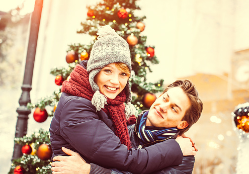 Young teenage couple enjoy christmas holidays
