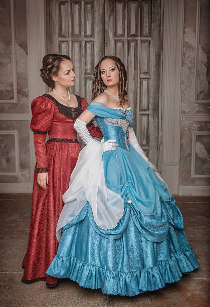 istock Two beautiful women in medieval dresses 526652739