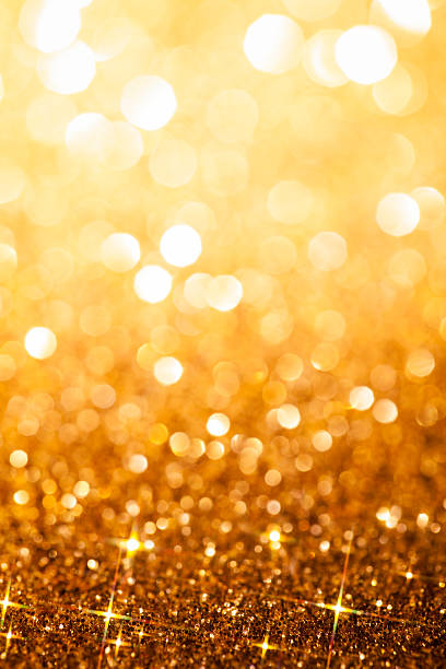 istock Golden Defocused Glitter Background - Christmas Bokeh Gold 526654557