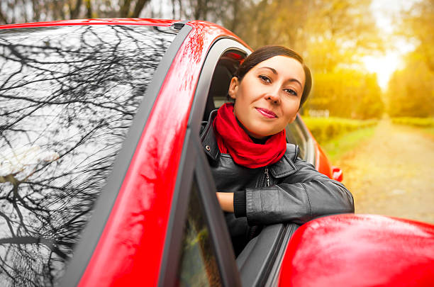 istock Girl driving a red car. 526655495
