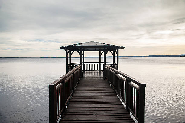 istock wooden gazebo on Lake Garda 526657187