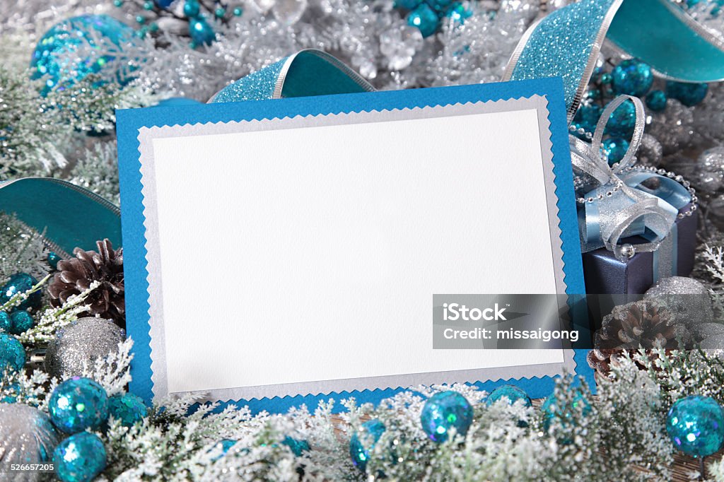 Christmas card or invitation with blue envelope surrounded by decorations Blank Christmas card or invitation with blue envelope surrounded by decorations. Space for copy. Berry Fruit Stock Photo