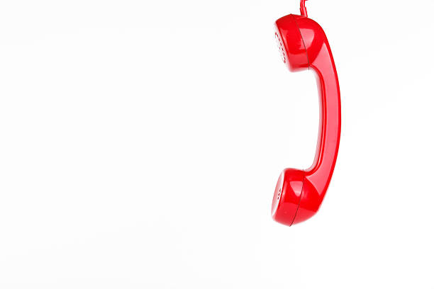 istock Classic red telephone on white background. 526663509