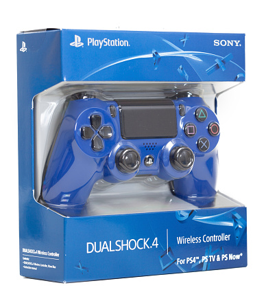 Las Vegas, USA - November 28, 2014: A photo of the Dual Shock 4 controller for the Playstation 4 video game system. The PlayStation 4 or PS4 is a video game console from Sony Computer Entertainment and was launched on November 15, 2013 in North America.